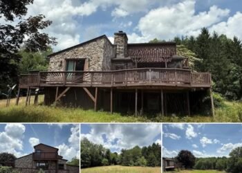 4-Bedroom Hilltop Home on Nearly 50 Acres in Scarbro, West Virginia 4 bedrooms • 2 bathrooms • 1,679 sq ft • Built in 1980 • 49.7 acres