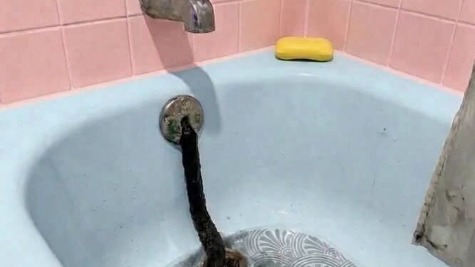 I Found Something Unusual Hanging From My Bathtub Drain—Here’s What It Turned Out to Be