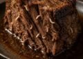 Pulled my beef roast out of the slow cooker and saw these weird white stringy things poking out of the meat. They look like little worms or parasites. Is the meat infested?