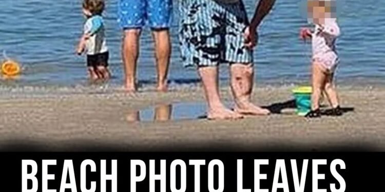 Beach family photo goes viral after viewers spot terrifying detail