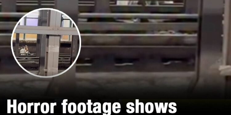 Footage shows what man and woman did moments before a train fatally struck them