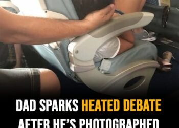 Dad sparks debate holding daughter’s head 45 mins while she slept on flight